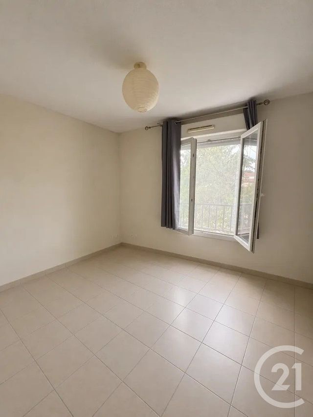 Appartement Duplex à louer - 3 pièces - 59.94 m2 - LESPARRE MEDOC - 33 - AQUITAINE - Century 21 Agence Biran