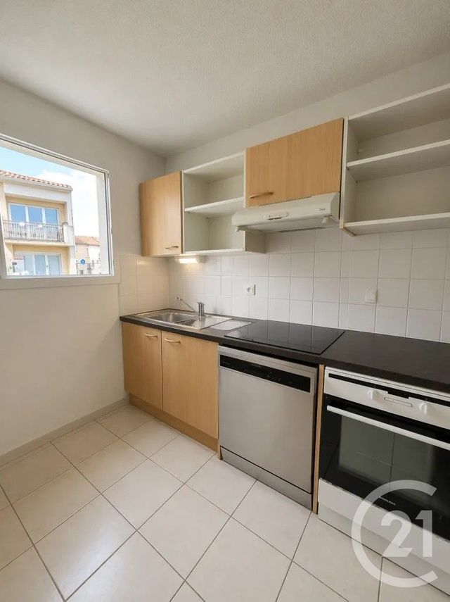 Appartement Duplex à louer - 3 pièces - 59.94 m2 - LESPARRE MEDOC - 33 - AQUITAINE - Century 21 Agence Biran