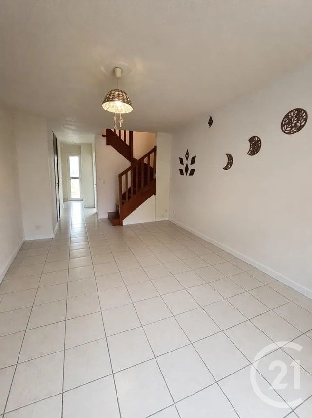 Appartement Duplex à louer - 3 pièces - 59.94 m2 - LESPARRE MEDOC - 33 - AQUITAINE - Century 21 Agence Biran